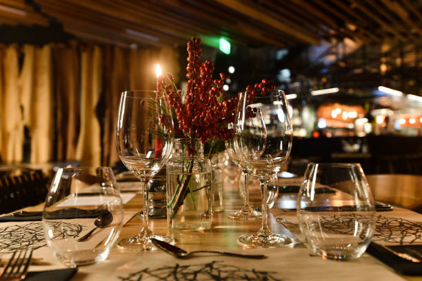 istock Beautiful decorated Xmas table with a red candle 1438321117