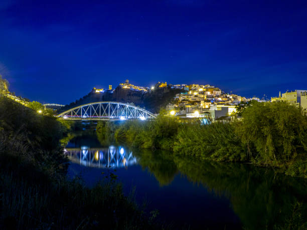istock Bridge on the river at night  in Arcos de la Frontera, Spain 1438322121