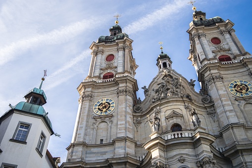 A low angle shot of the facade of Abbey of St. Gall in Switzerland against blue sky