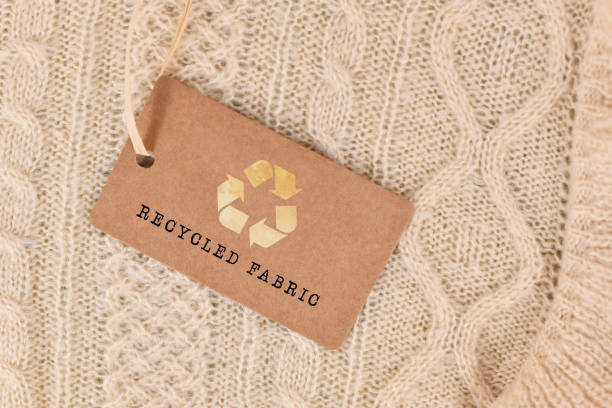 istock Knitted fabric with label saying 'recycled fabric' 1438324017