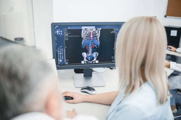 istock Medical specialists sitting at the computer and analyzing the investigation results 1438324297