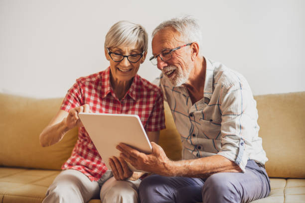 istock Senior couple at home 1438326095