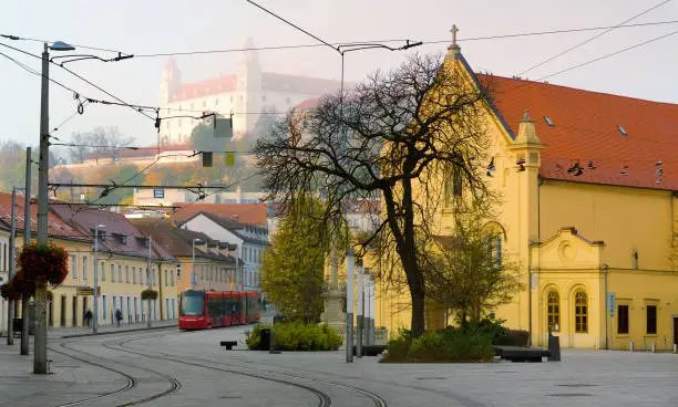 Early morning in center of Bratislava with tramline and historic architecture