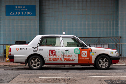 Hong Kong - November 2, 2022 : Didi Taxi in Hong Kong. Didi Chuxing is China's leading mobile transportation platform.