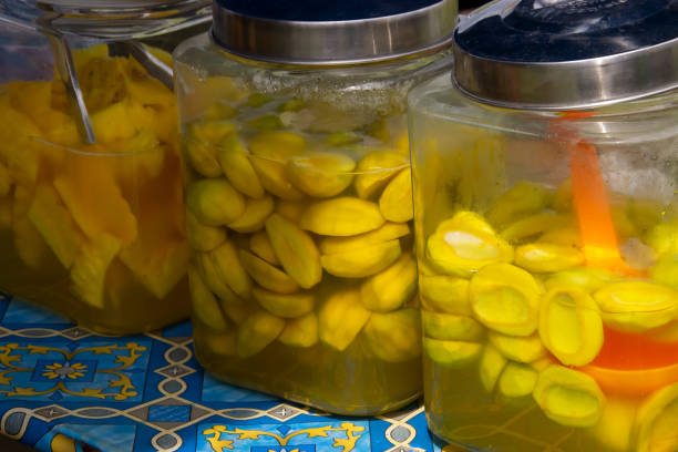 istock pickles mango and pineapple placed in a jar, selling street vendors 1438329548