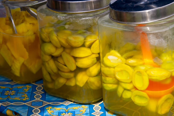 pickles mango and pineapple placed in a jar, selling street vendors