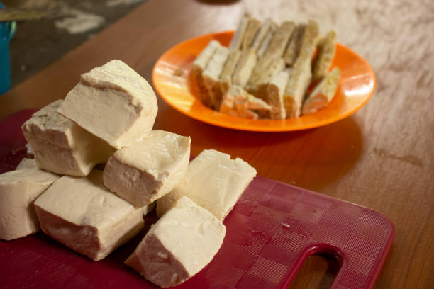istock Tempe and tofu in their respective containers on a chocolate table 1438330538