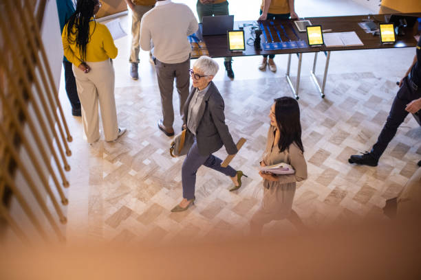 istock Businesswoman entering a hotel with her assistant 1438332091