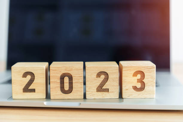 istock 2023 Year block against computer laptop background. Goal, Target, Resolution, strategy, plan, finance, budget, motivation, and New Year start concepts 1438332326