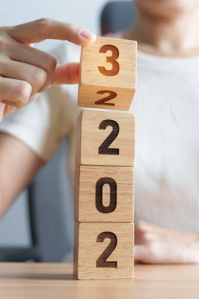 istock 2022 change to 2023 year block on table. goal, Resolution, strategy, plan, start, budget, mission, action, motivation and New Year concepts 1438332489