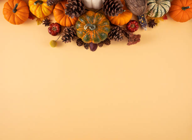 istock Thanksgiving Wreath with Autumn Leaves and Pumpkins 1438334563