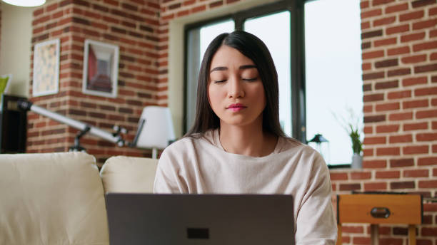 istock Focused freelancer woman working remotely from home on modern laptop 1438336891