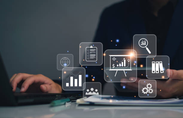istock business management concept. development and management Executives looking virtual screens business management icons Goal setting, information, workflows, optimal business operations and innovation 1438337441