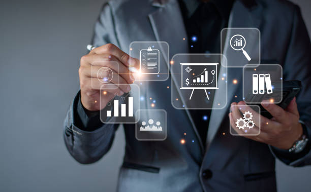 istock business management concept. development and management Executives looking virtual screens business management icons Goal setting, information, workflows, optimal business operations and innovation 1438337453