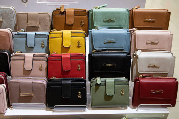 Colored leather unbranded wallets, in a display stock photo