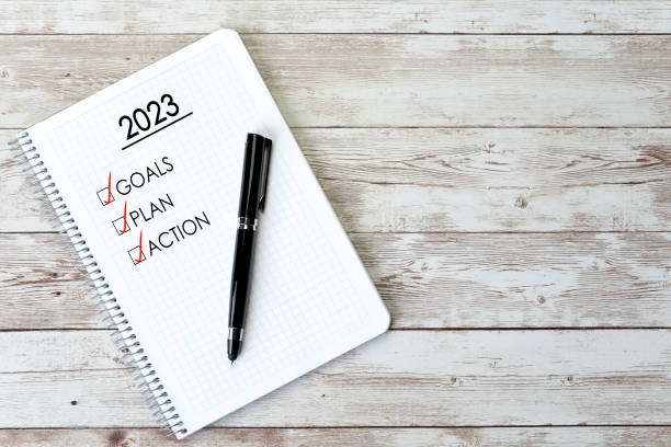 istock Notebook with a to-do list for the year 2023 - concept, goals and action plan, new year 1438337771