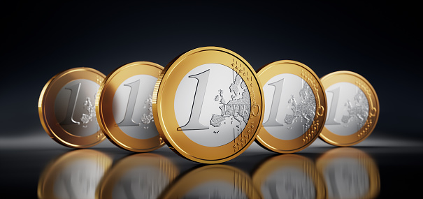 Group of Euro coins on glossy black background - 3D illustration