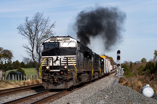 Ashb, United States – November 05, 2020: A Norfolk Southern train smokes as it gets underway