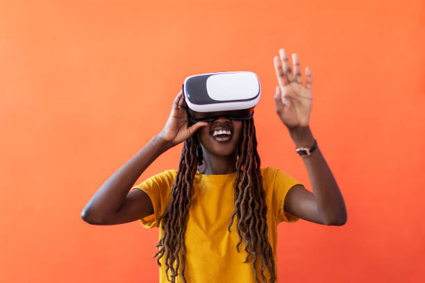istock Black young woman in virtual reality glasses 1438352288