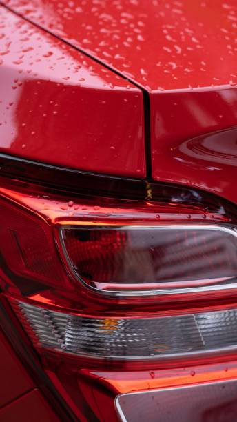 istock Vertical closeup of a red car's tail light. 1438354041