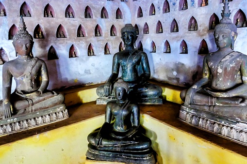 The beautiful Asian stone statues inside a historic building