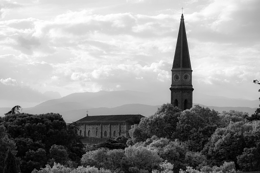 A black and white shot of the Arezzo Cathedral in the city of Arezzo in Tuscany, Italy