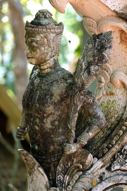 istock Vertical shot of a weathered buddhist statue 1438356554