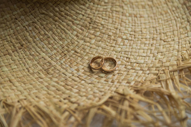 istock Two wedding rings on the floor with contrast 1438357178
