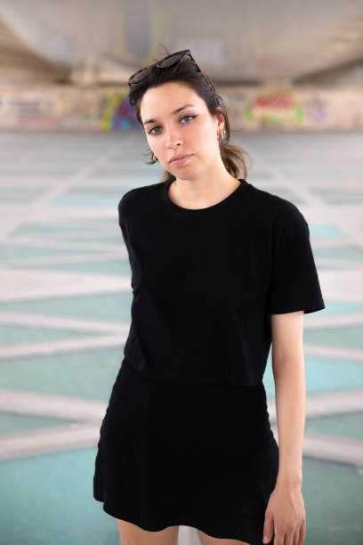 istock Young woman with cool attitude posing 1438357501