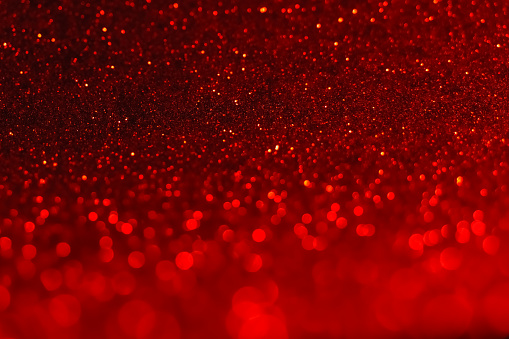 Red abstract light background. Christmas background
