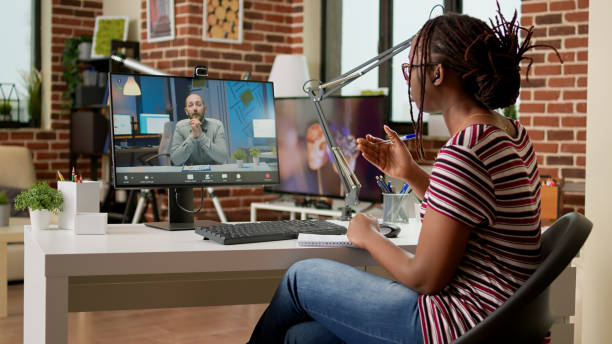 istock Businesswoman talking to manager on online videoconference call 1438359106