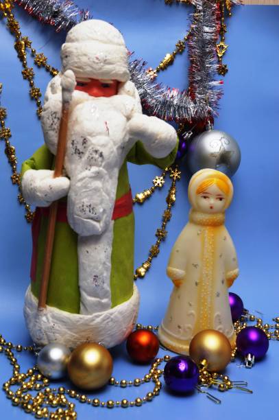 istock Santa Claus and Snow Maiden 1438359237