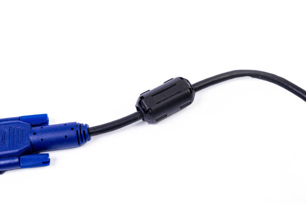 istock Close up of a ferrite bead inductor on cable on isolated white 1438362677
