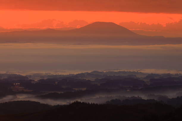 istock Sunrise and misty landscape 1438362906