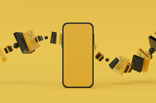 Blank screen smart phone. Black Friday concept. Yellow background.