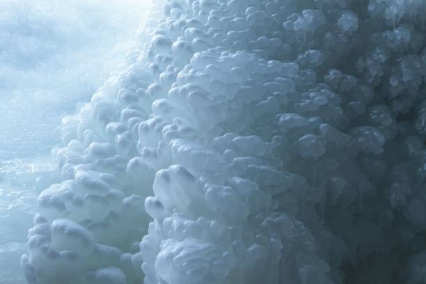 A beautiful ice blob formation under a frozen waterfall.