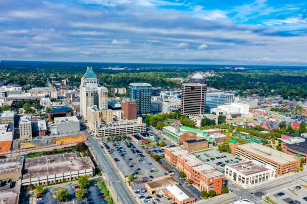 istock Skyline on a cloudy summer day in Greensboro, North Carolina 1438365581