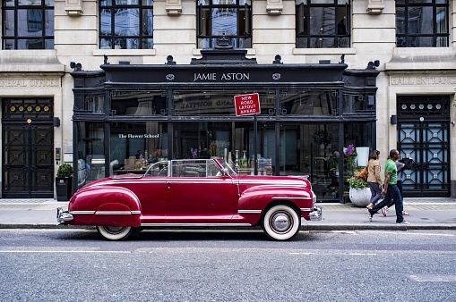 London, United Kingdom – September 08, 2013: American 1940s Dodge Convertible outside a flower shop in Fitzrovia, London
