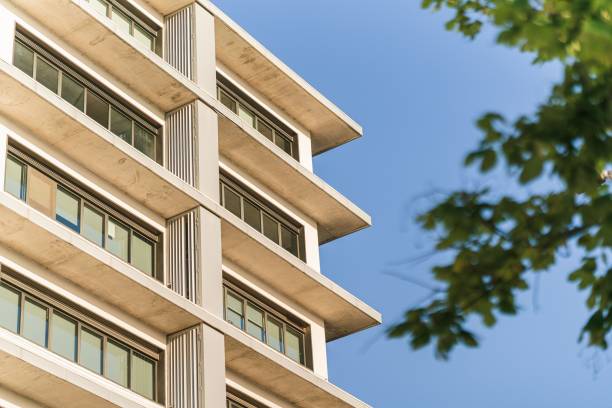 istock Low-angle view of a building's exterior under the blue sky 1438366934