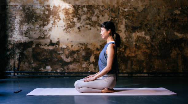 istock Side View Of Beautiful Woman Practicing Yoga 1438371347