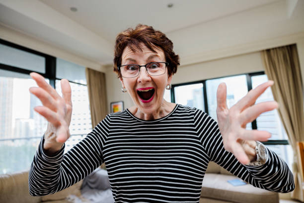 istock Surprised woman indoors. 1438371378