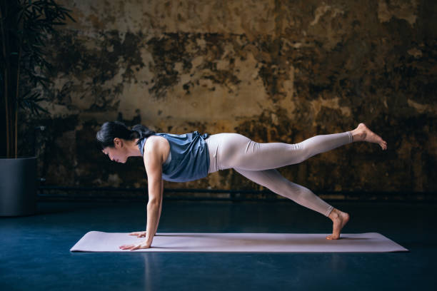 istock Happy Woman Practicing Yoga 1438371442