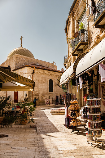 Jerusalem, Israel- October 17, 2022. Street view of Old  Neighbourhood of Old City of Jerusalem, Israel. Narrow alleys and streets of ancient old city with stores, vendors and restaurants.