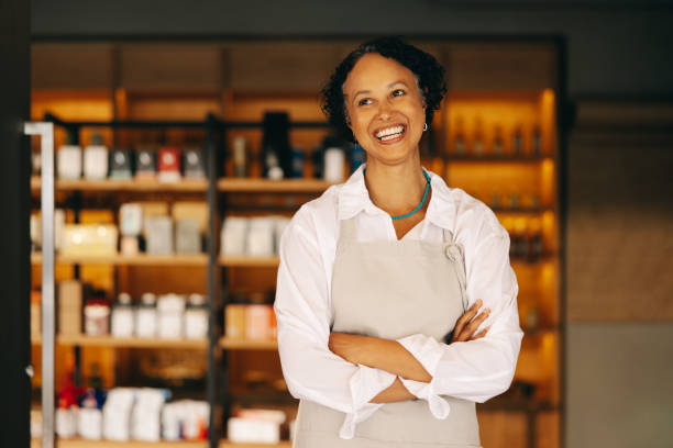 istock Successful small business owner smiling happily 1438376410