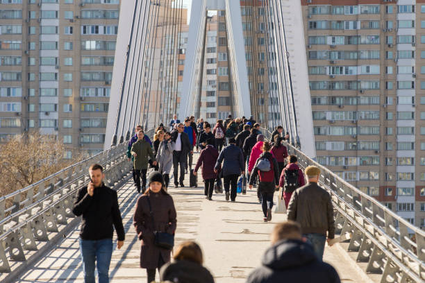 Moscow-Russia - 09.09.2021: Pedestrian bridge across the Moskva River from the Pavshinskaya floodplain to the Myakinino metro station.