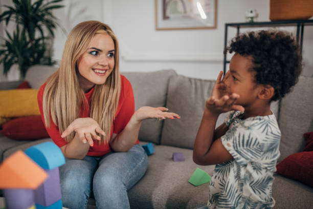 istock Mother and son playing with toys 1438381951