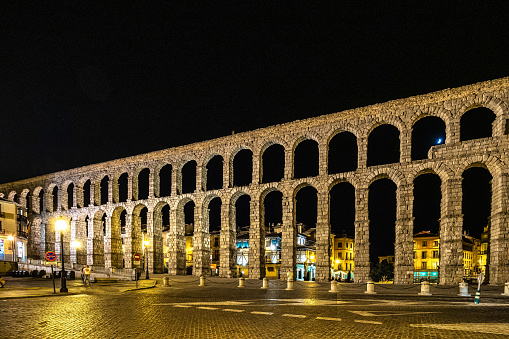 Roman Aqueduct of Segovia at night, one of the best-preserved elevated Roman Aqueducts and a symbol of Segovia. Castile and Leon, Spain.