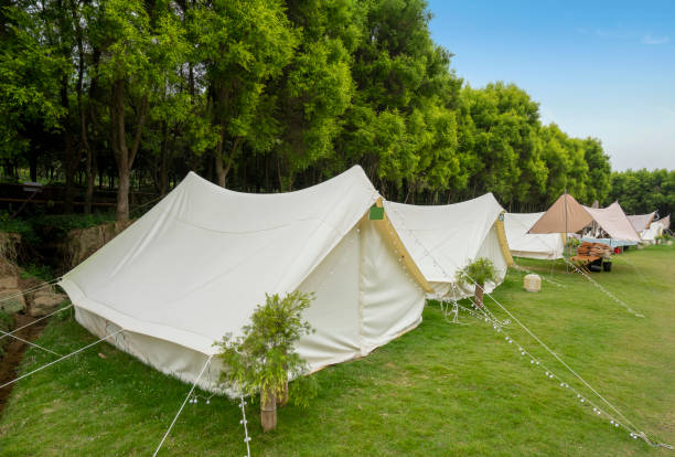 istock The campsite in the forest is covered with tents 1438383900
