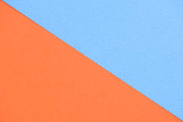 istock Orange and blue textured paper background 1438385671
