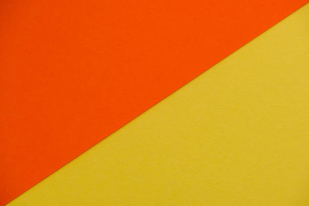 istock Yellow and red textured paper background 1438385701